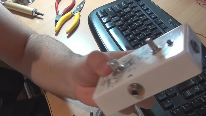 Install the knobs and backplate: Attach knobs to potentiometers and secure the backplate.