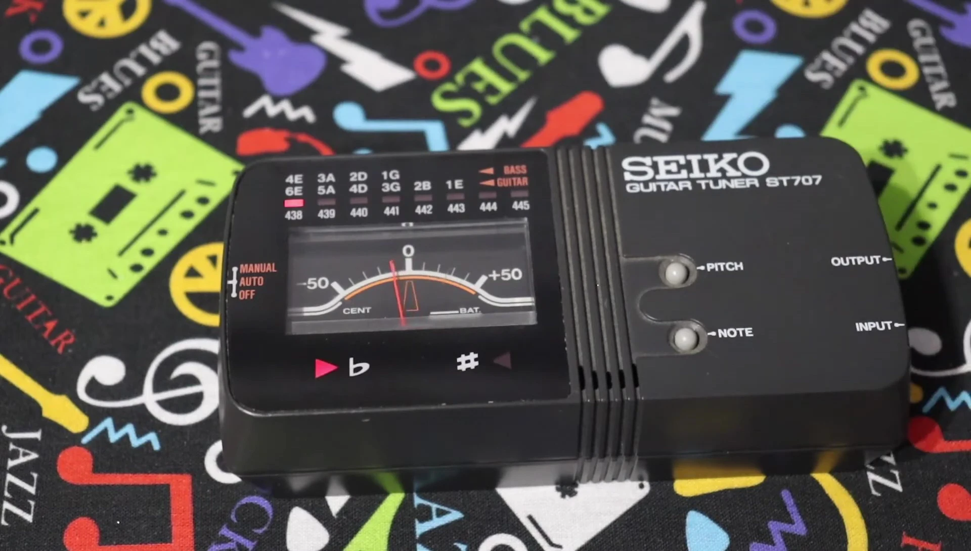 Tuner being used with an acoustic guitar using the built-in microphone.