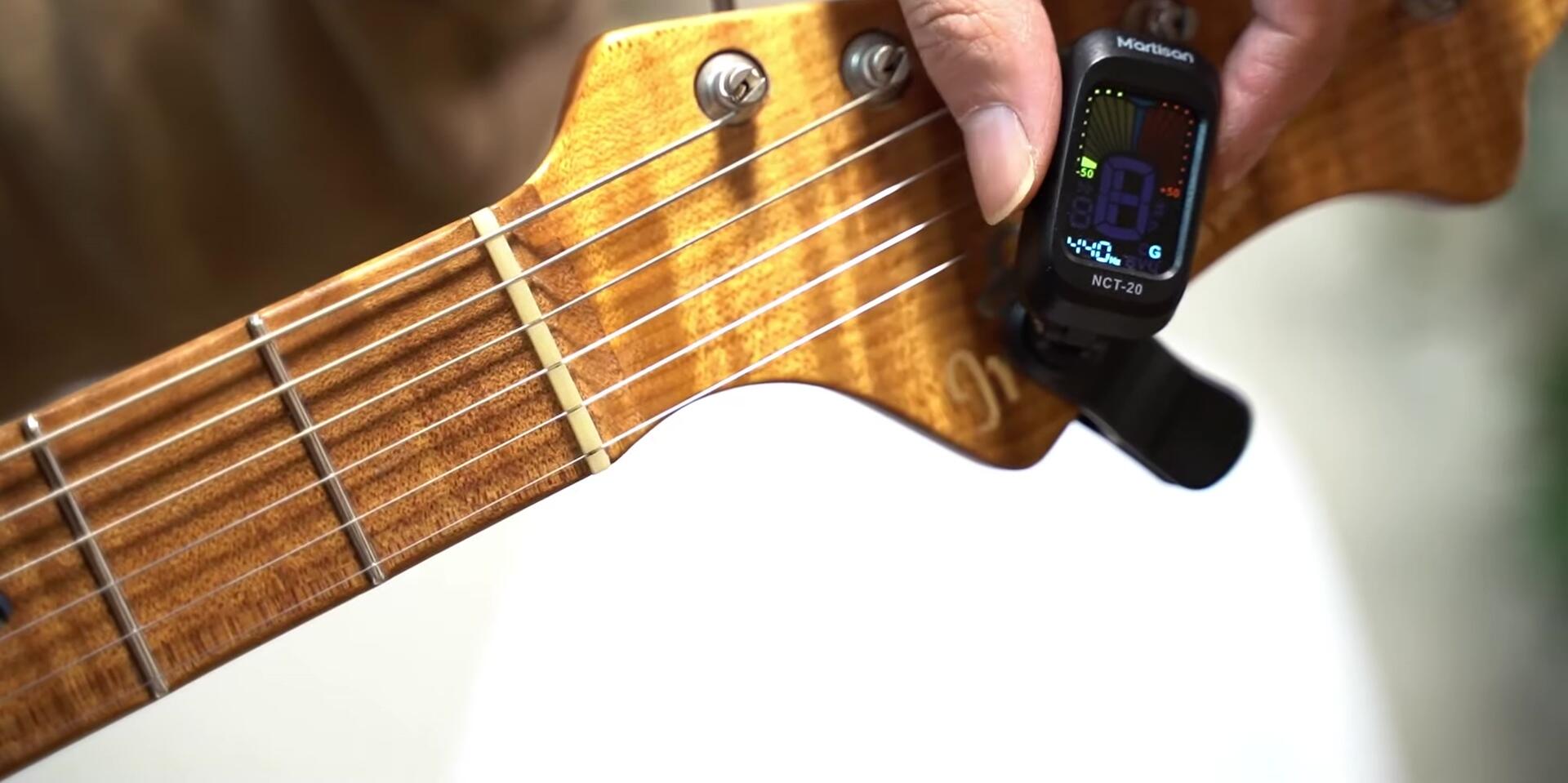 Close-up of the March NCT-20's power button and mode selector.