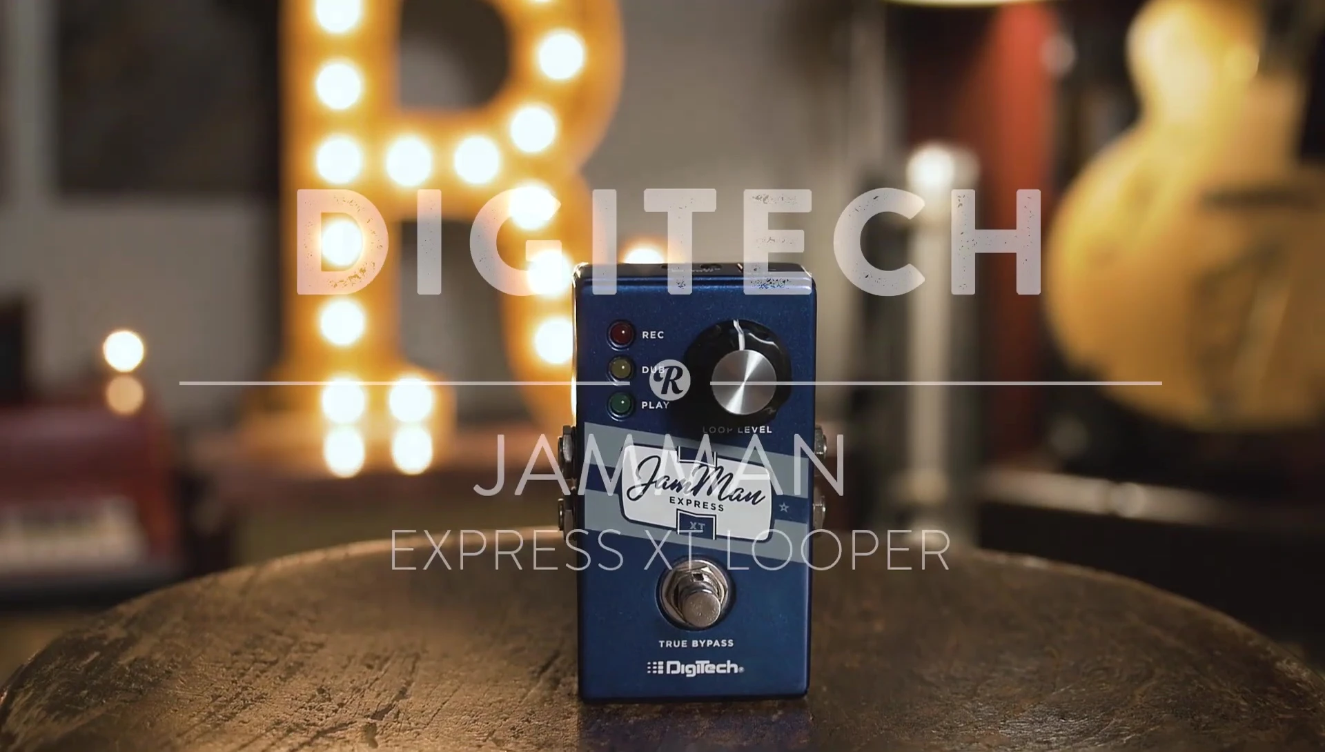 Close-up of the Digitech Jamman Express XT pedal showing the volume knob and foot switch.