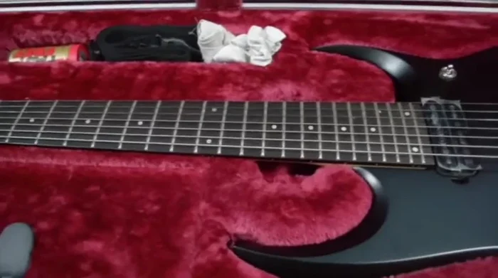 Share personal experiences of negative consequences (neck bending, string buzz) due to inadequate protection, emphasizing the importance of a hard case.