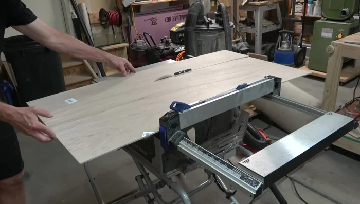 Attach top and bottom to sides with glue and brads, using weights to ensure flatness while drying.