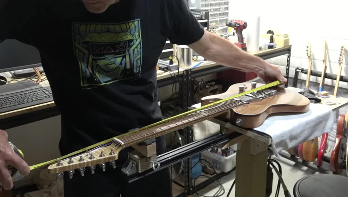 Cut end pieces and sides, accounting for end piece thickness in side length calculations.