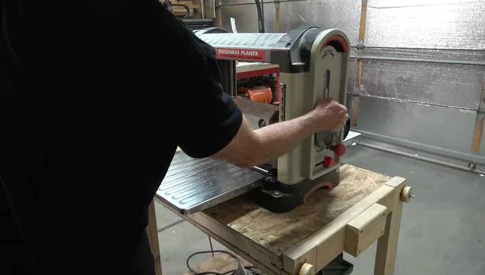 Cut end pieces and sides, accounting for end piece thickness in side length calculations.