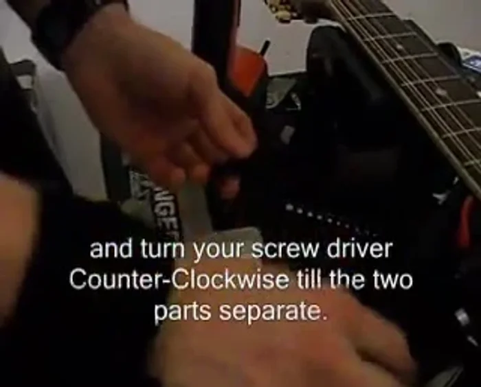 Remove the internal mechanism from the tuner casing. The screw will be on the handle.