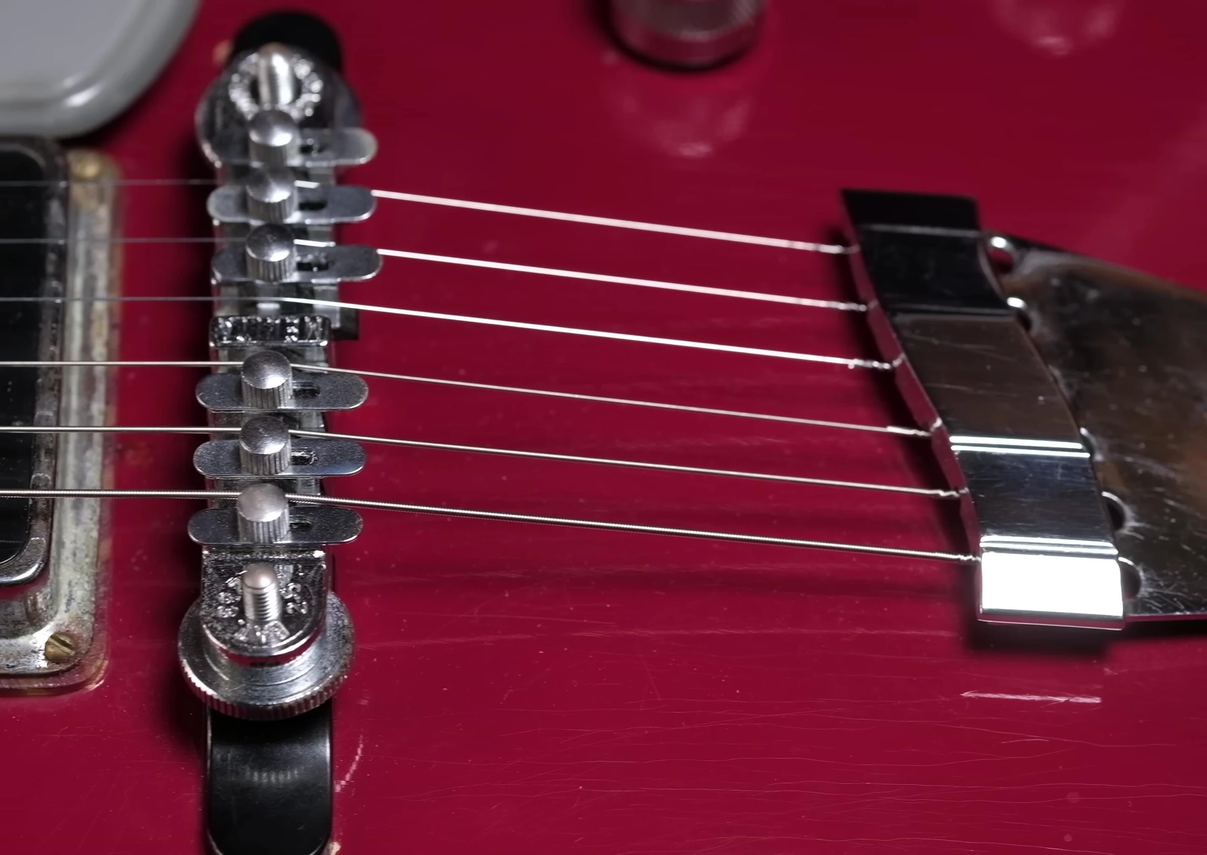 Showcase of the original Molita bridge and tailpiece