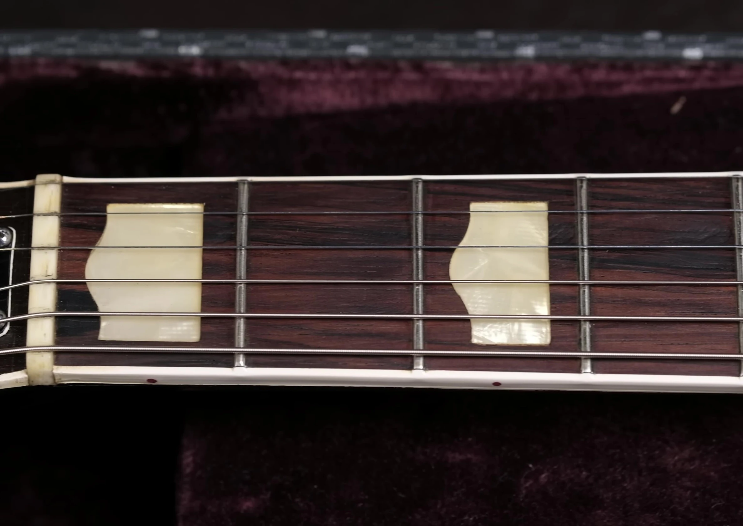 Close-up shot highlighting the humpback inlays