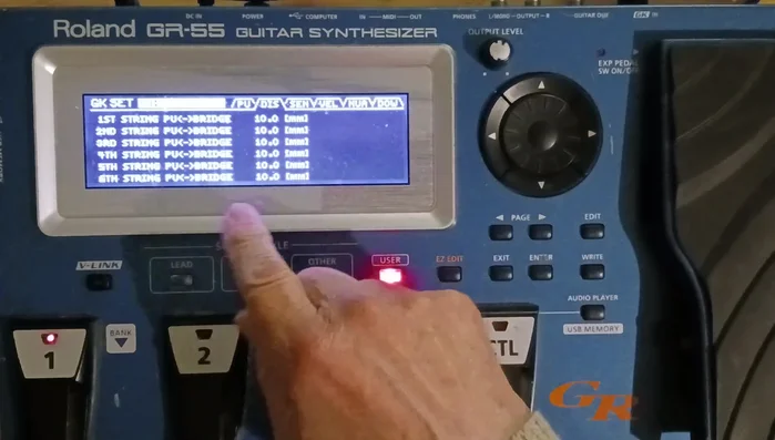 Adjust Distance Setting: Fine-tune the distance between the GK pickup and strings (measured in millimeters). The default is often 10mm.
