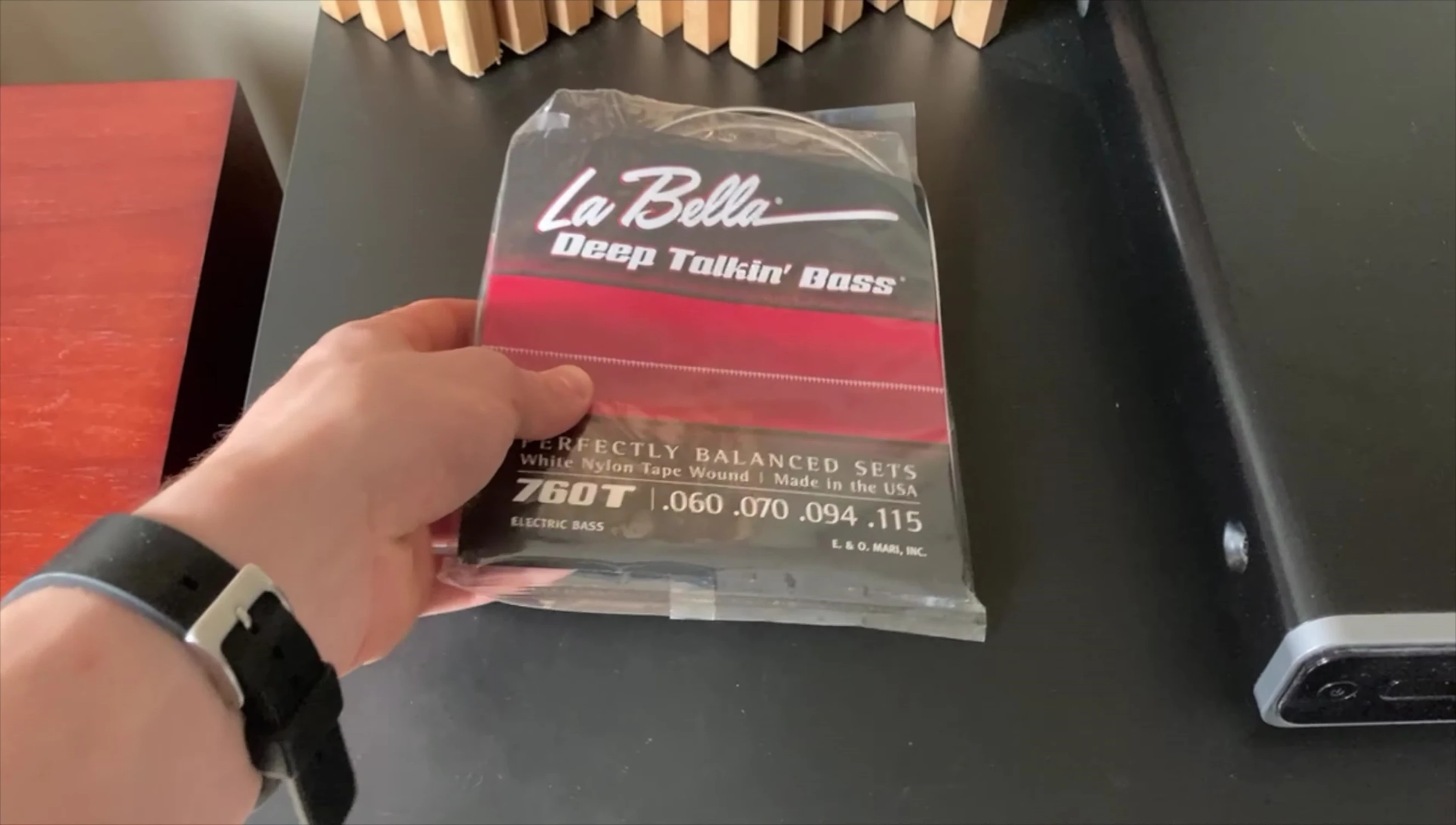The bassist mentions his previous experience with LaBella 760TS strings.