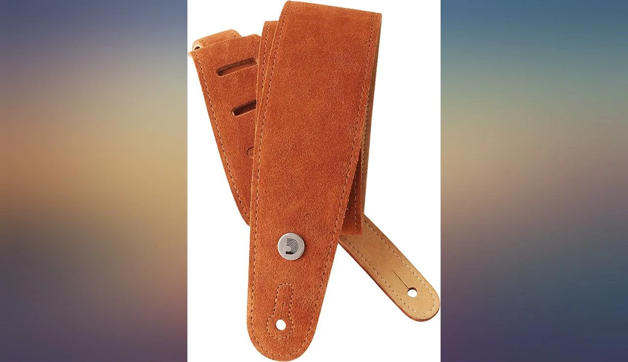 A close-up shot of a well-worn but still functional D'Addario strap.