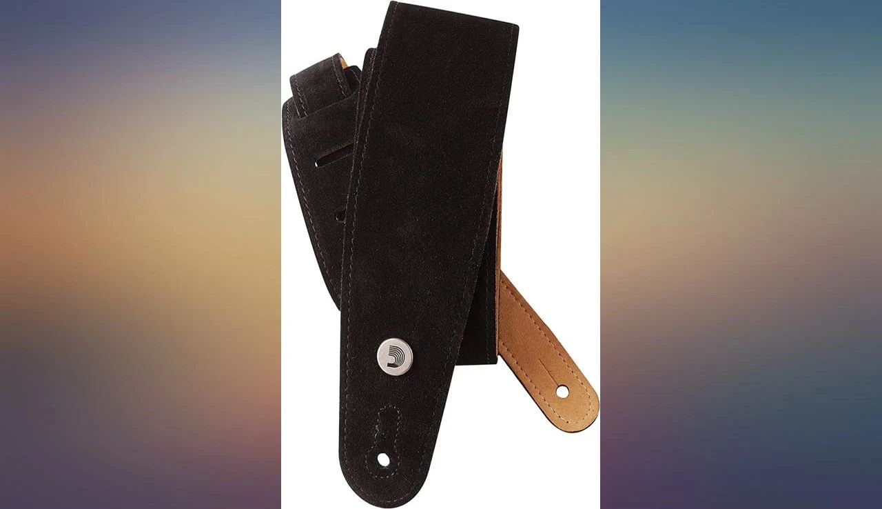 The reviewer playing the guitar, showcasing the strap's performance.