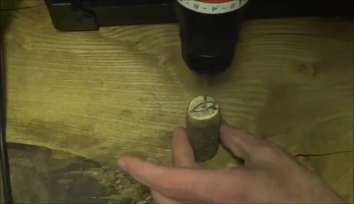 Use a larger drill bit to drill out the bulk of the socket. Take it slow, especially for the middle hole, and consider using a vice.