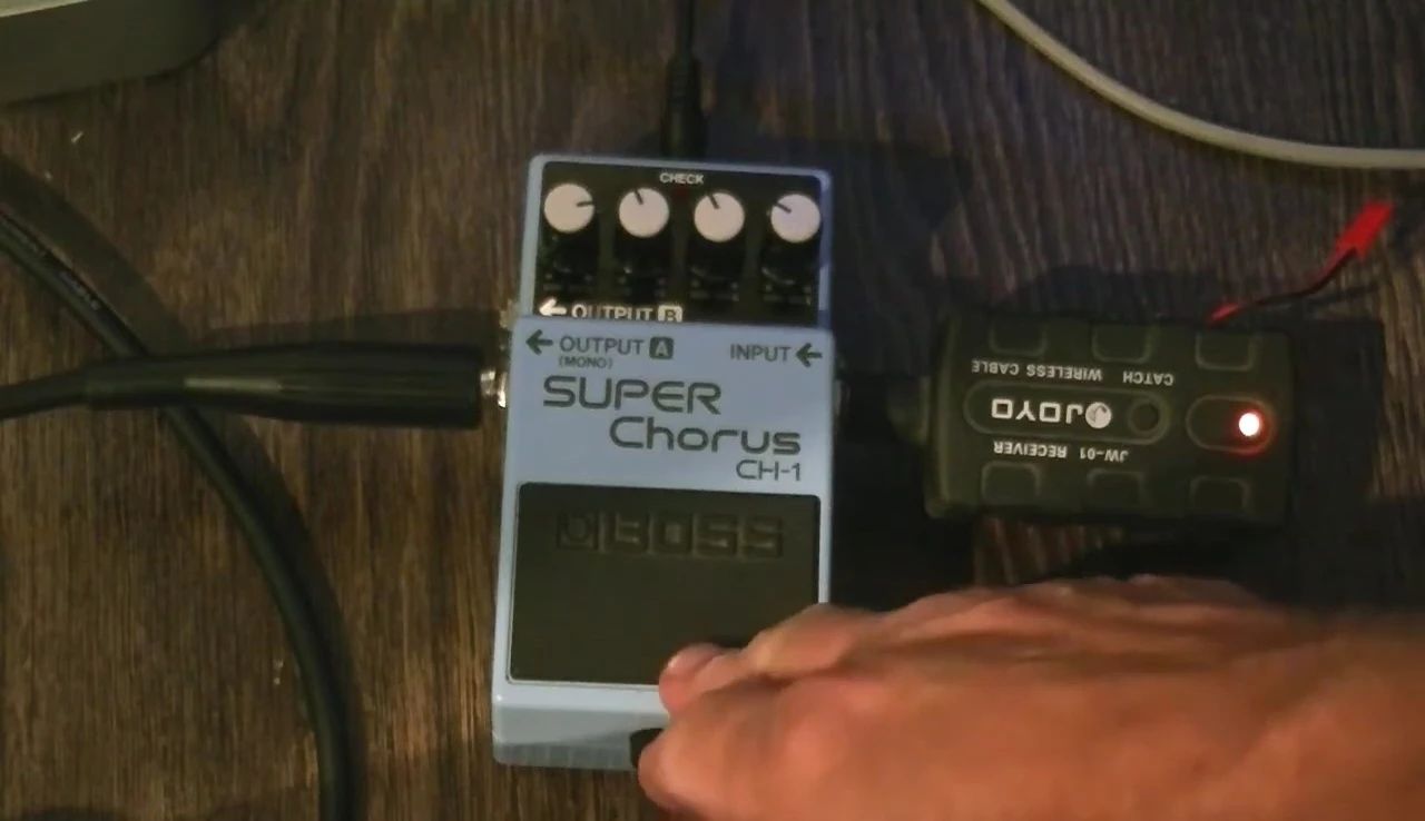 Close-up of the Boss CH-1 Super Chorus pedal showing the knobs and settings.
