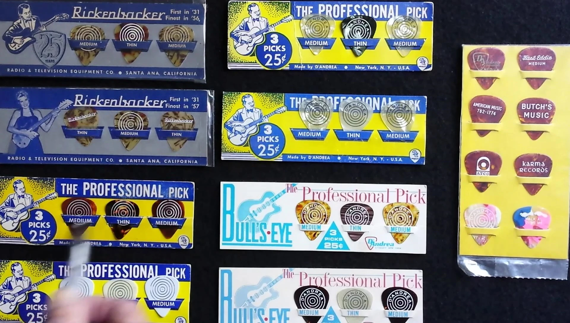 A collection of D'Andrea Professional pick cards showing various designs