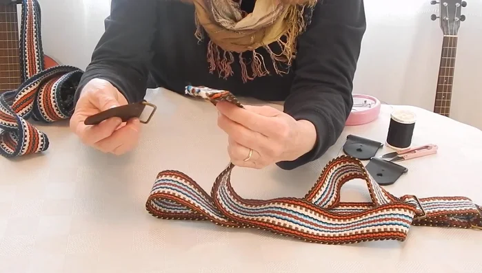 Repeat the underlapping and stitching process used for the adjustment slider. (Optional: Top-stitch with a sewing machine).