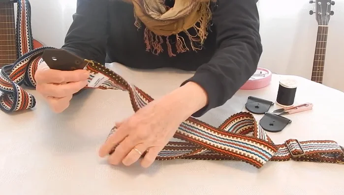 Repeat the underlapping and stitching process used for the adjustment slider. (Optional: Top-stitch with a sewing machine).