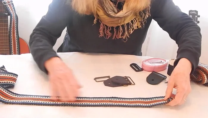 Hand-stitch the slider in place, underlapping the underside to prevent overlap on the front. (Optional: Top-stitch with a sewing machine afterwards).