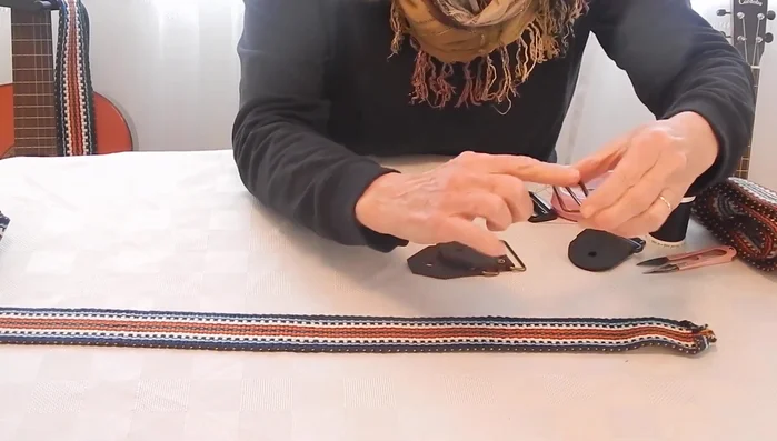 Hand-stitch the slider in place, underlapping the underside to prevent overlap on the front. (Optional: Top-stitch with a sewing machine afterwards).