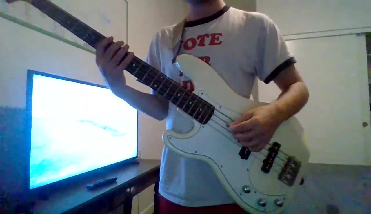 The bassist comparing old and new strings