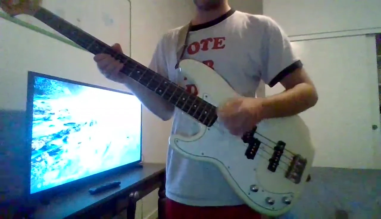 The bassist demonstrating string bending