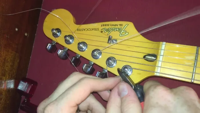 Tune your guitar and stretch the strings.