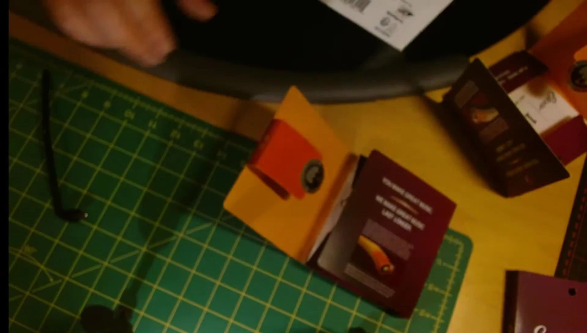 Close-up of poorly folded fake Elixir string packaging.
