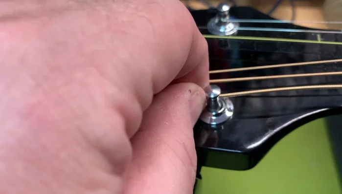 Get your slack (less for thicker strings).