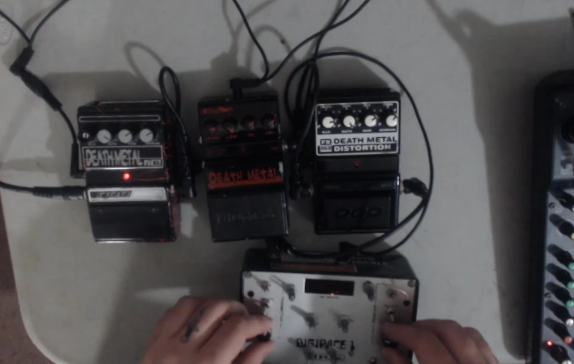 A view of the setup with the synthesizer and pedals