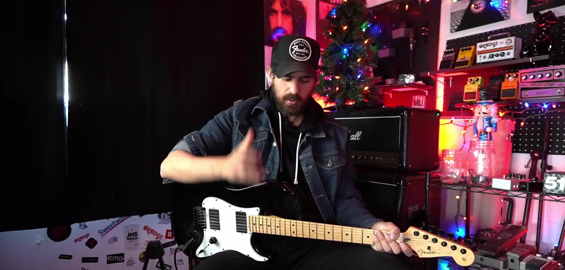 The presenter highlighting the features of the classic Whammy pedal.