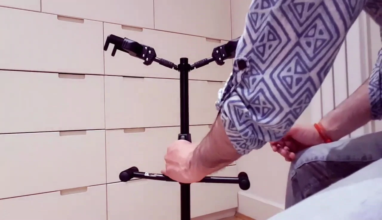 Demonstrating the height adjustment mechanism in action.