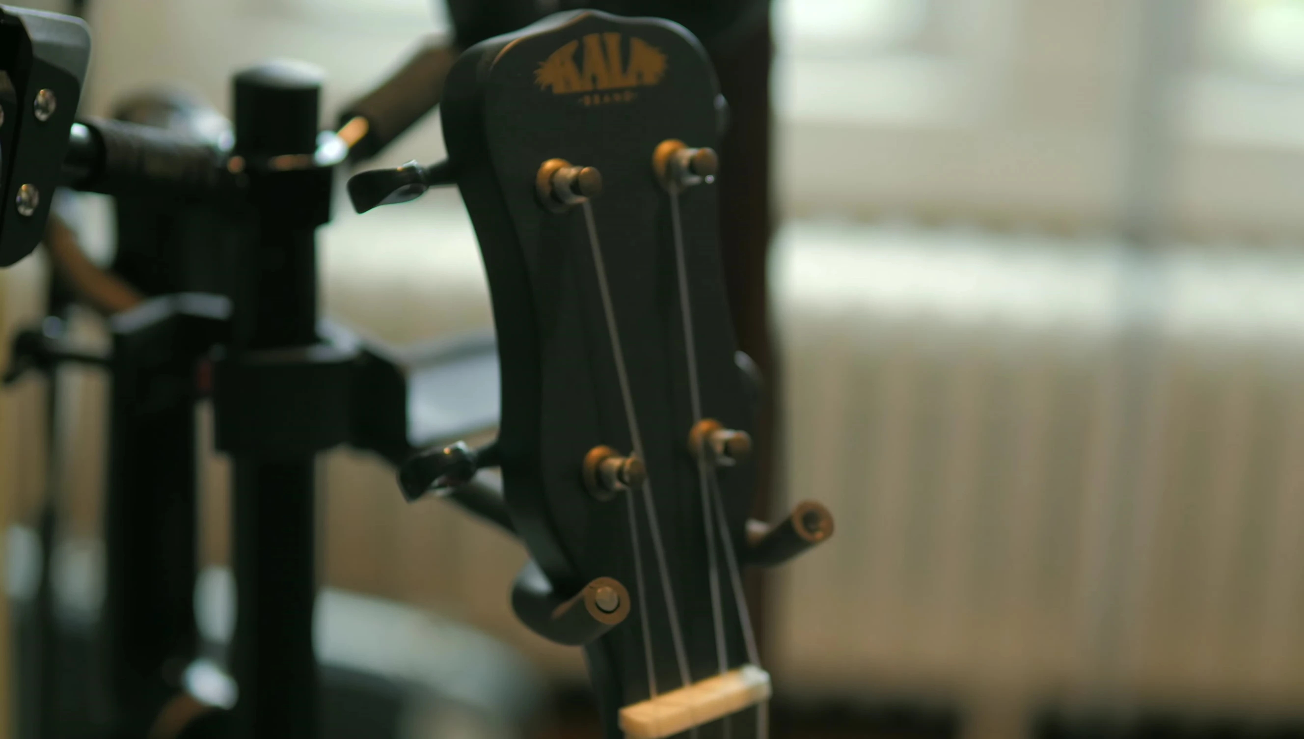 All three instruments on the stand, showcasing its capacity.