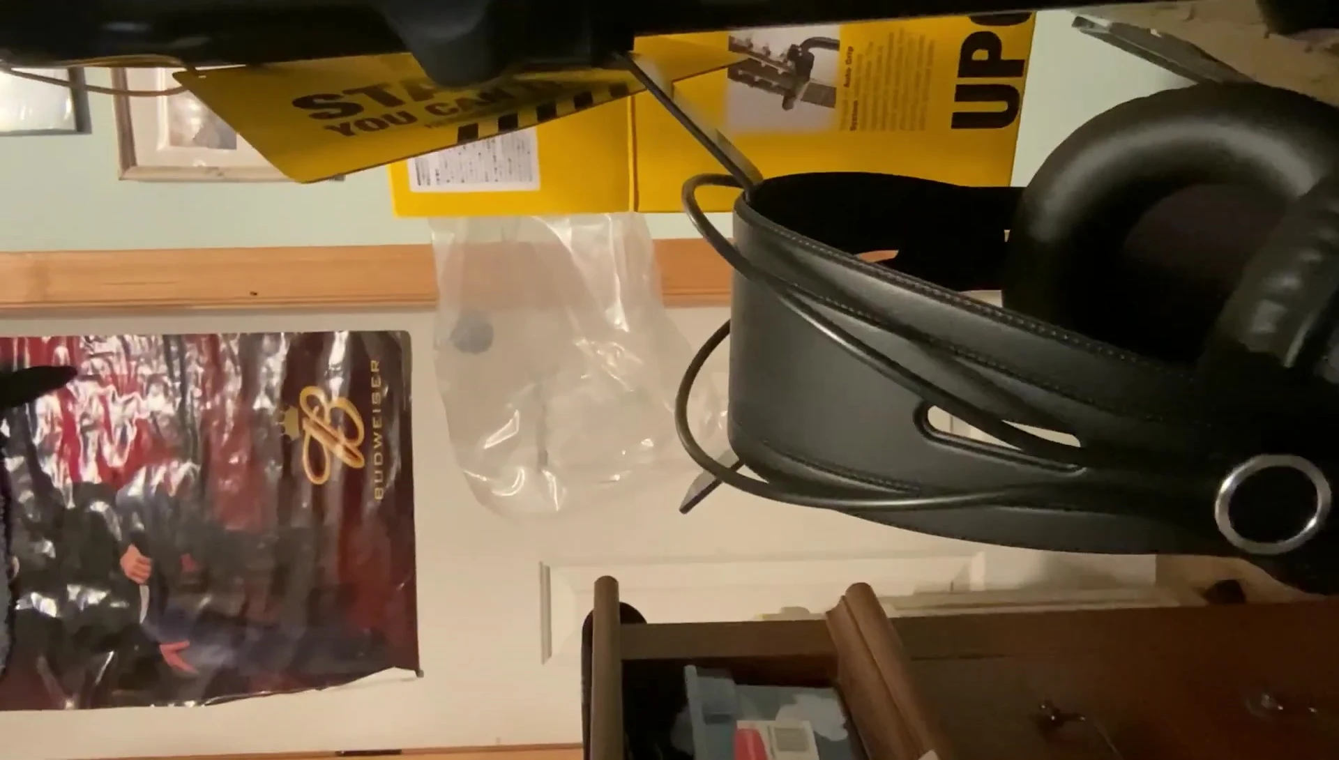 The headphone/strap holder in use.