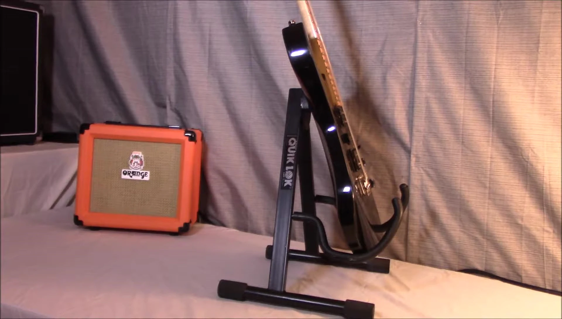 Close-up of the Quik Lok A-frame guitar stand being unboxed