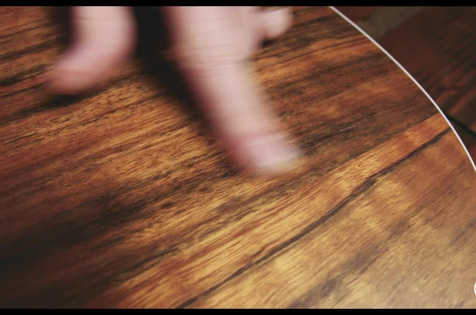 Close-up of text showing the amount of moisture a guitar holds.