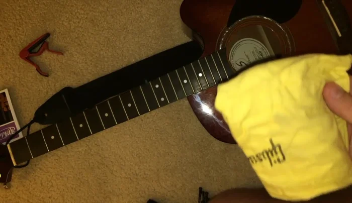 Clean your guitar using the Gibson guitar care pack. Apply restoration finish cream to the body and fretboard conditioner to the fretboard.