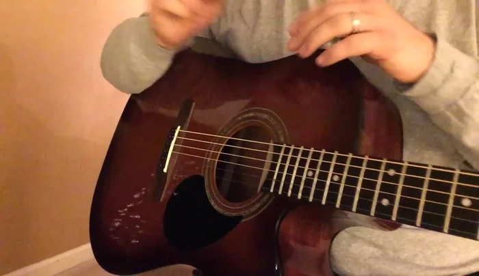 Cut excess string using the wire cutter on the JP guitar tool.