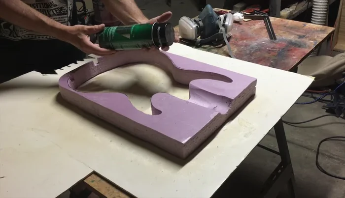 Carefully apply the faux fur, tucking it in and ensuring proper alignment.