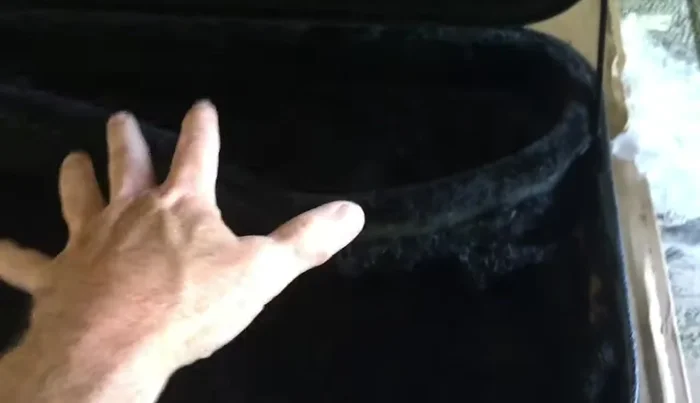 Remove existing faux fur around the body cavity.