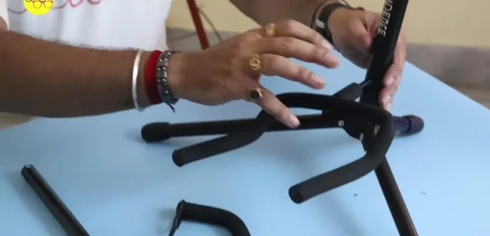 Place the unfolded stand on a flat surface.