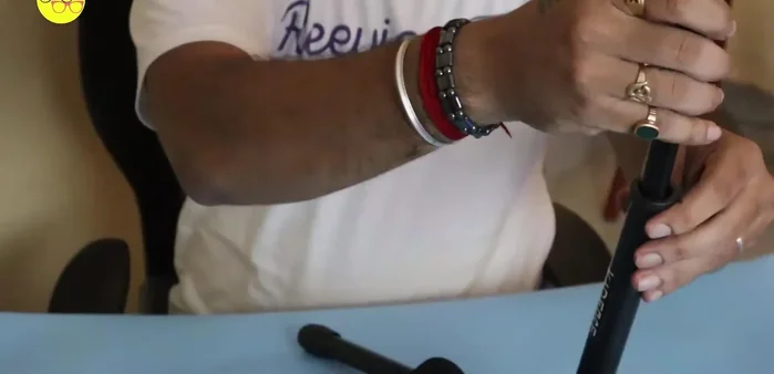 Place the unfolded stand on a flat surface.