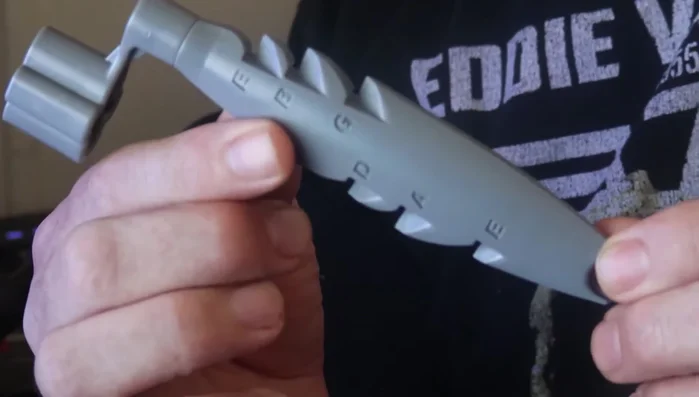 Discussion of Cuda Winder's features: string gauge markings, pin puller, string tensioning mechanism.