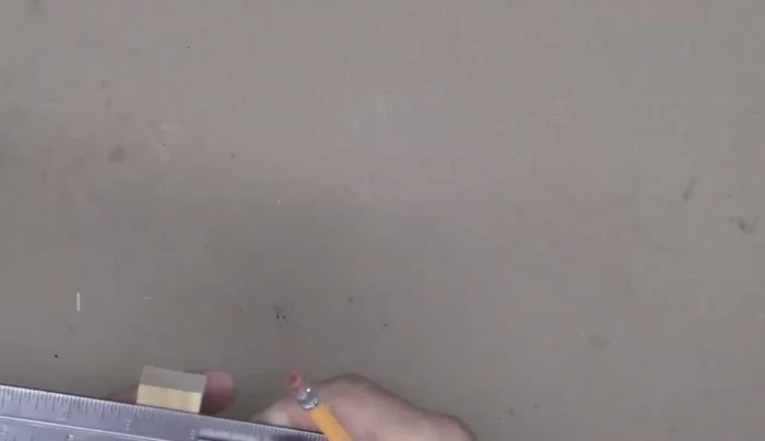 Cut out the marked shape using a saw and clamp.