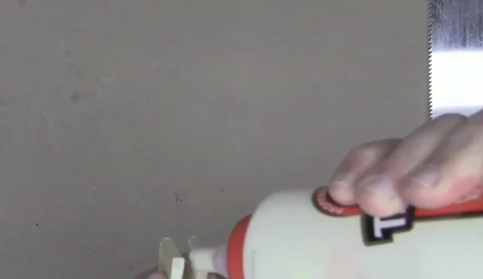 Glue and clamp the small wood pieces onto the ends of the main piece to prevent slippage.