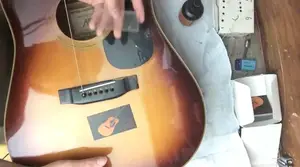 How to Remove Bridge Pins from a Steel String Guitar Bridge: The Ultimate Guide