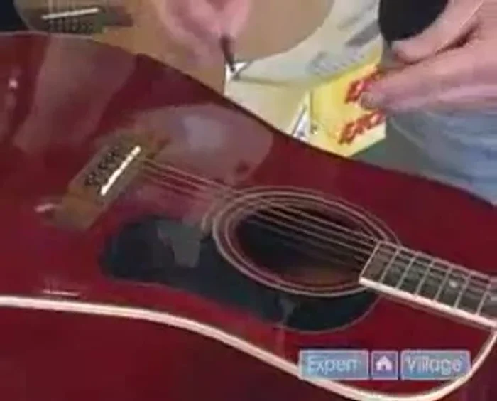 Pull the string tight and push down on the ball end to secure it.