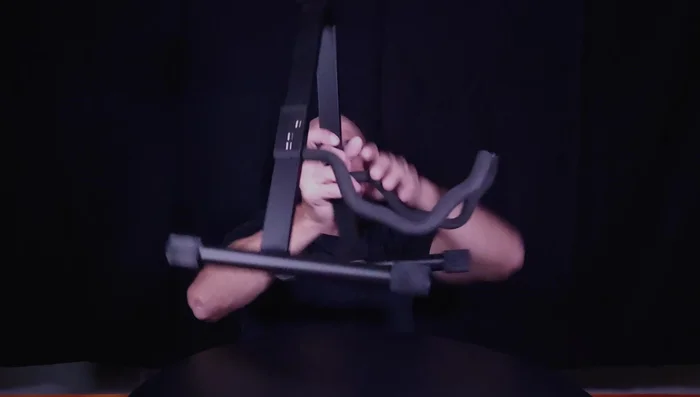 Demonstration of the stand's folding and unfolding mechanism.