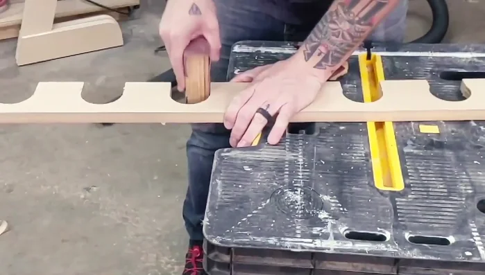 Sand the inside and edges of the neck rest.