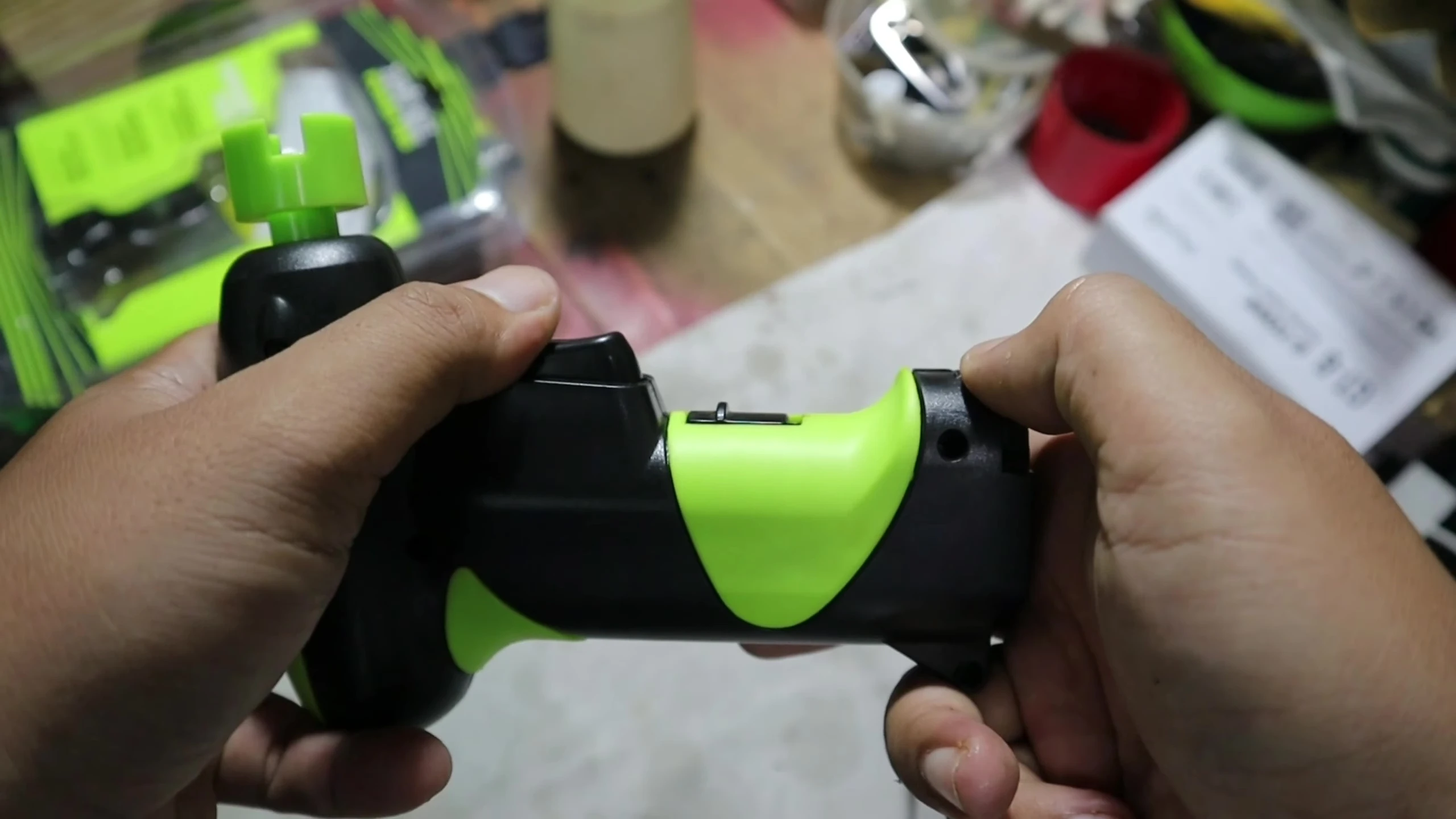 Close-up shot highlighting the battery compartment and controls.