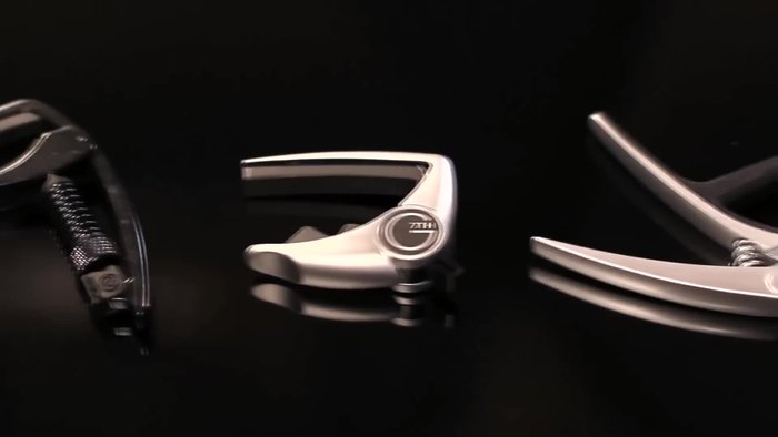 On guitars with a larger radius (like Taylor or Martin), the traditional capo applies too much pressure to the outer strings, causing tuning issues.