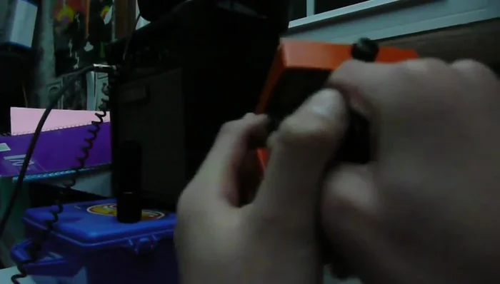 Insert the 9-volt battery into the compartment, ensuring correct polarity.